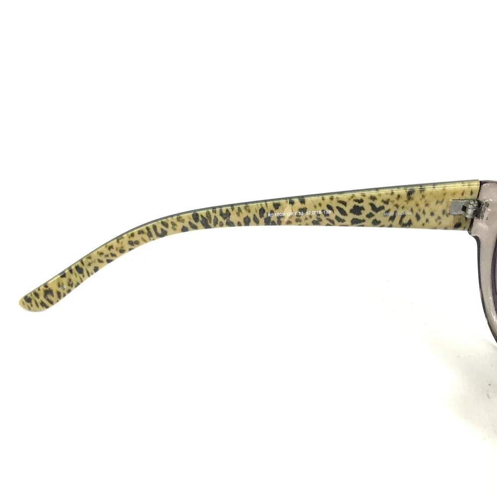 Rampage Sunglasses RS10009 GRY-35 Black Brown Cat Eye Frames with Purple Lenses